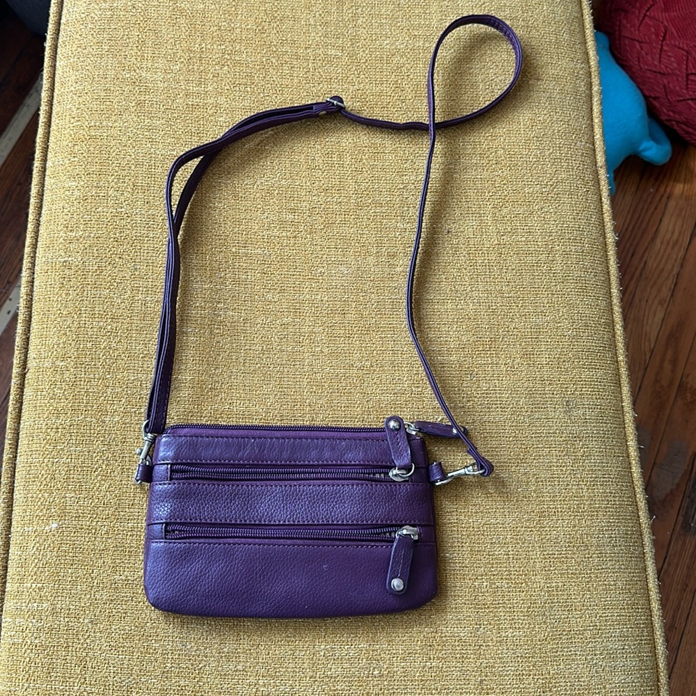 Soprano leather Eggplant purple wristlet with long strap.